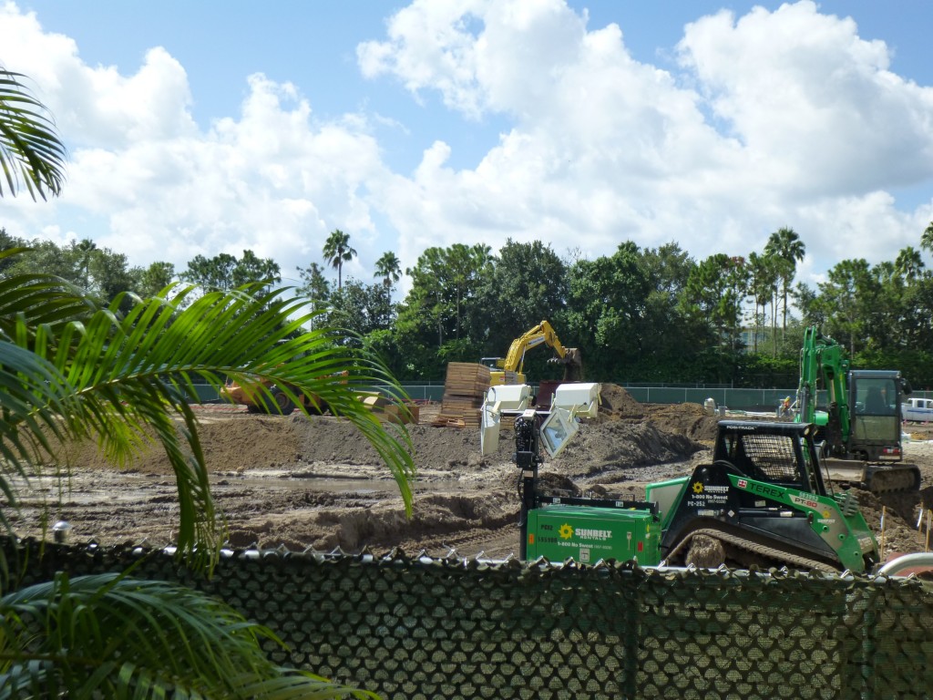 Over the fence we can see the ground is not as flat as before, with lots of digging and pipes being placed