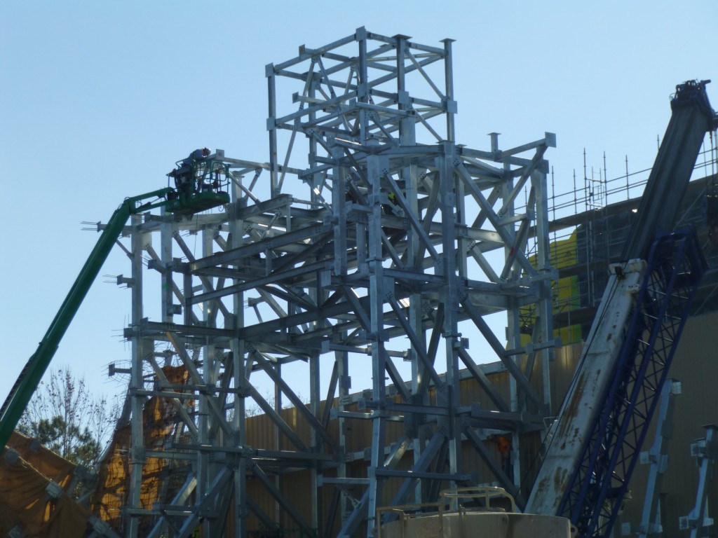Workers building the gate structure