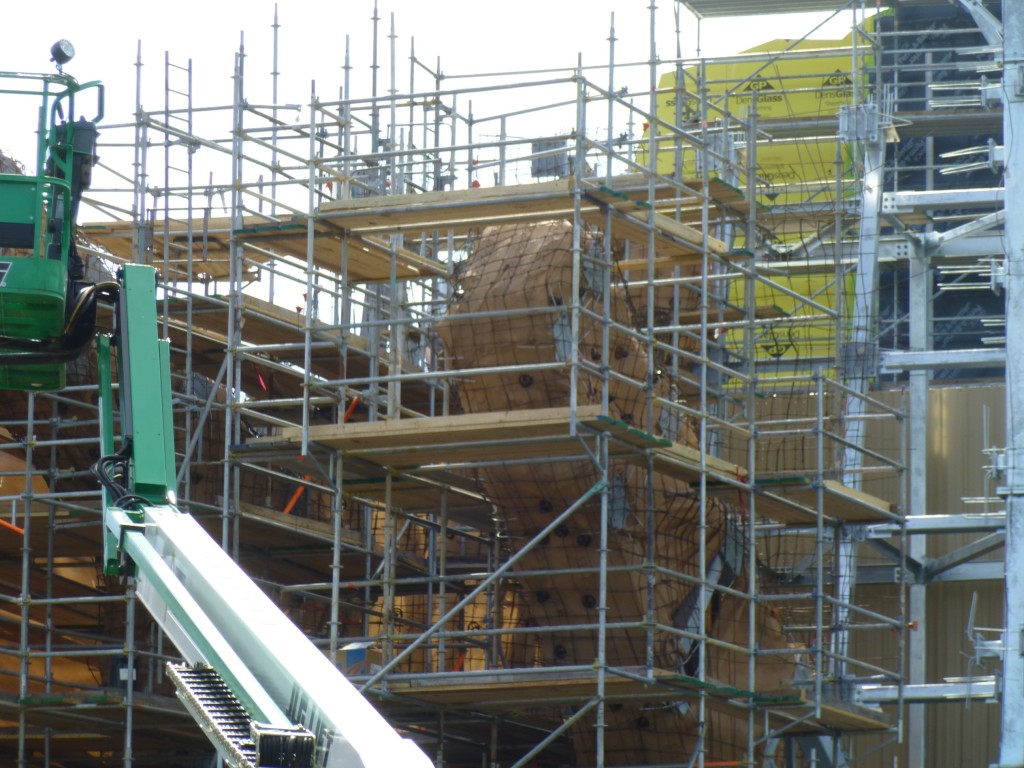 A close-up view of one of the temple arms wrapped in wire mesh