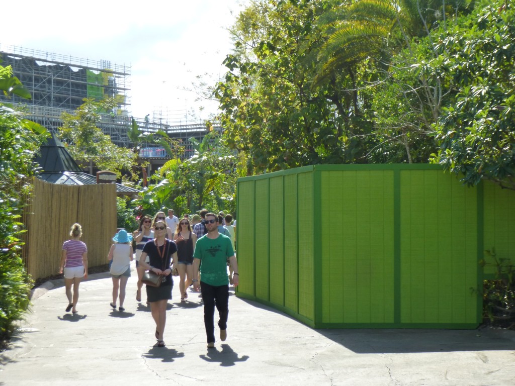 Mysterious green construction walls that have appeared across the pathway, bordering Camp Jurassic side