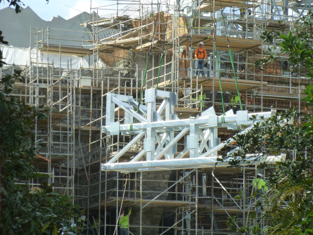 Steel piece being lifted into place