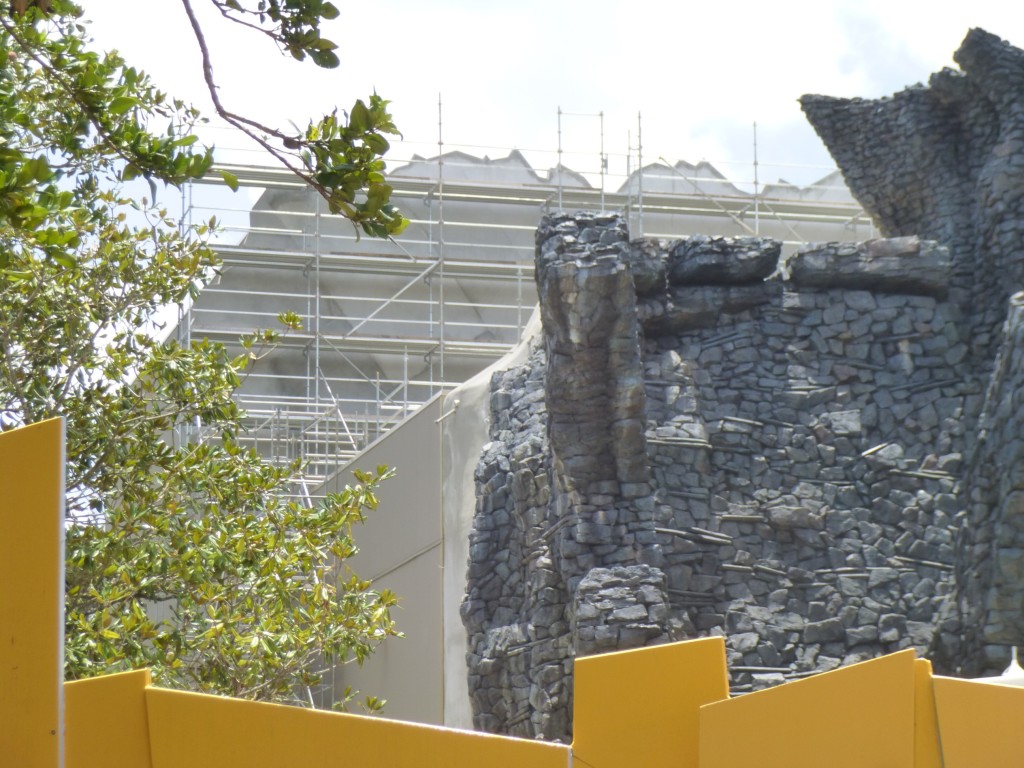 Sculpted concrete connection between facade and building walls added, filling the gap