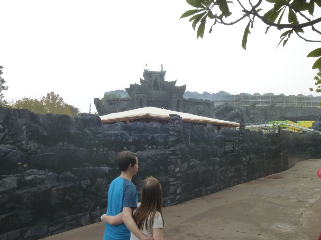 Going down the walkway, the roof of a hut is a visible