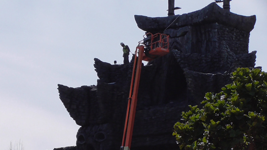 Tethered to a rope atop the temple