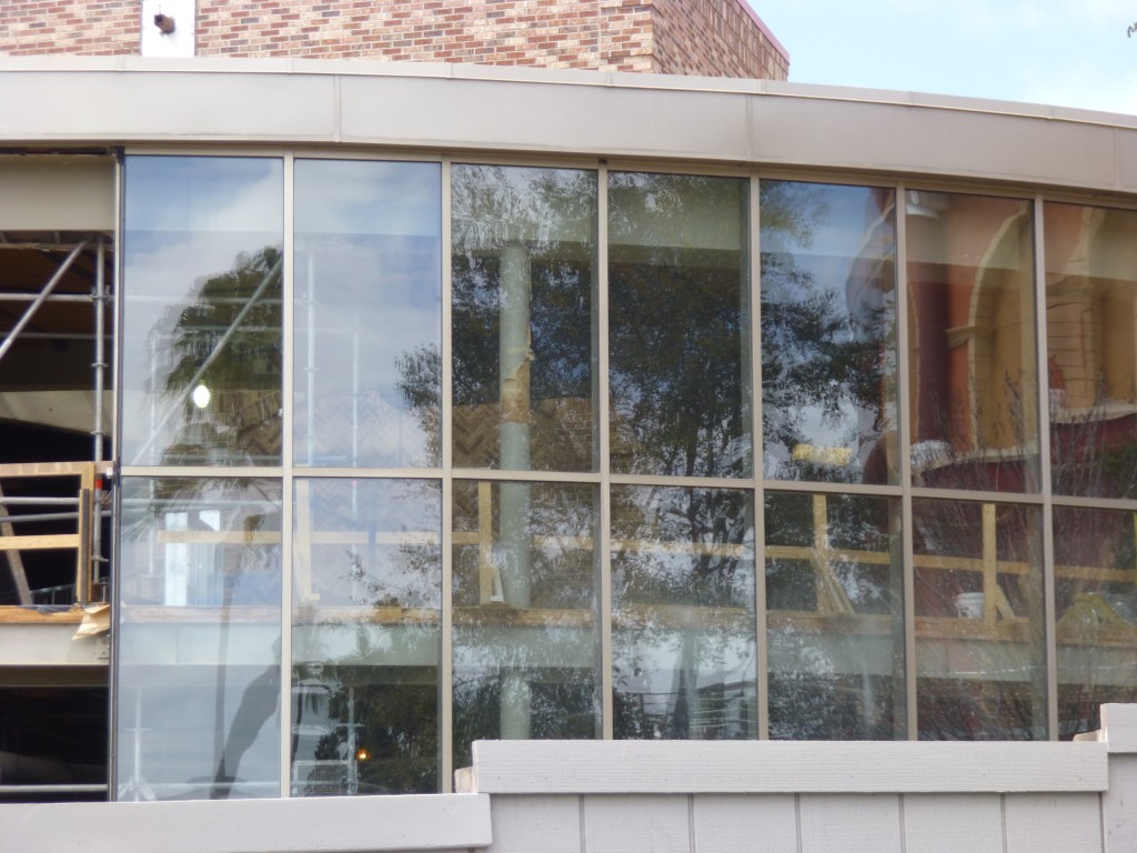 Giant metal grates in front of windows have been removed