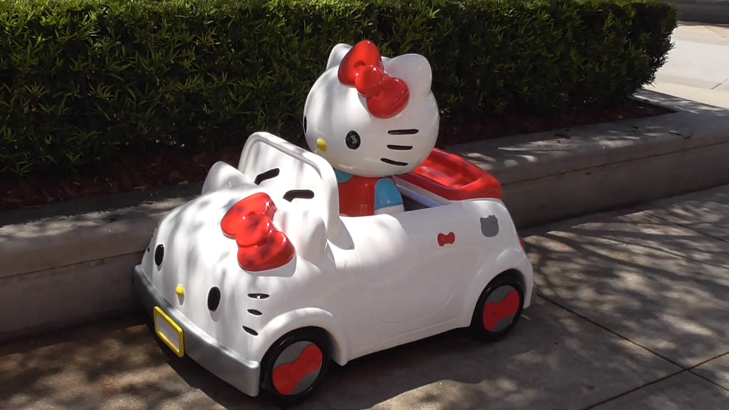 There's room in the backseat to get your picture taken riding with Hello Kitty