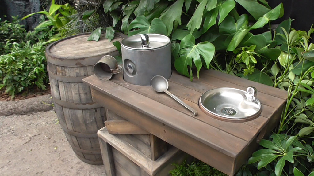 Themed water fountains in the queue
