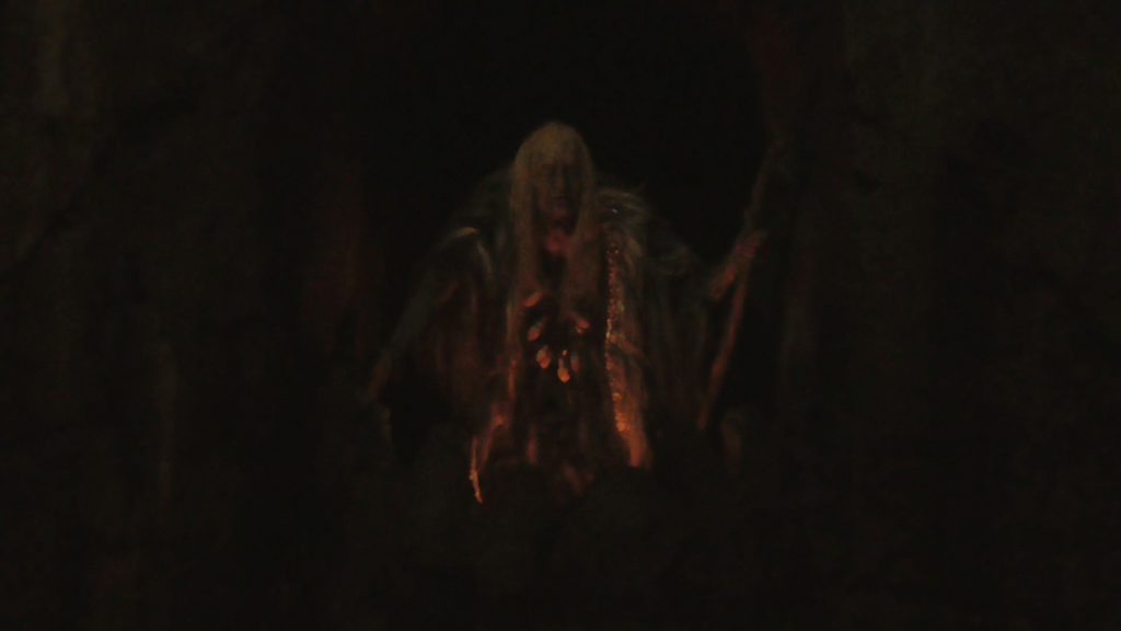 A closer look at the "witch" animatronic, as she summons Kong