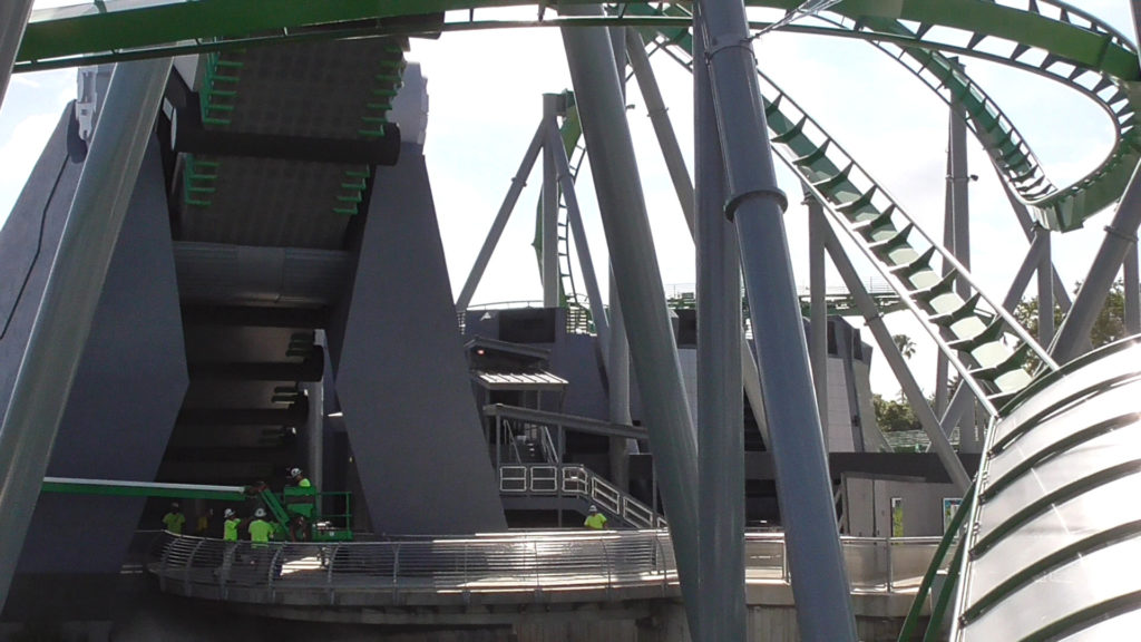 Workers working on the ride exit area