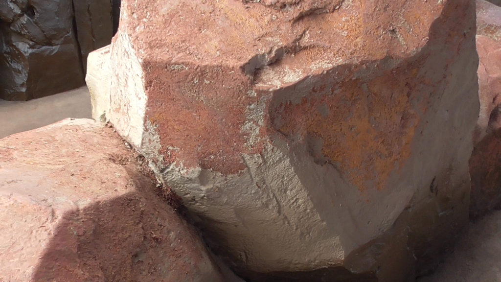 Rocks that are facing guest pathways have had much of their paint worn off over the years