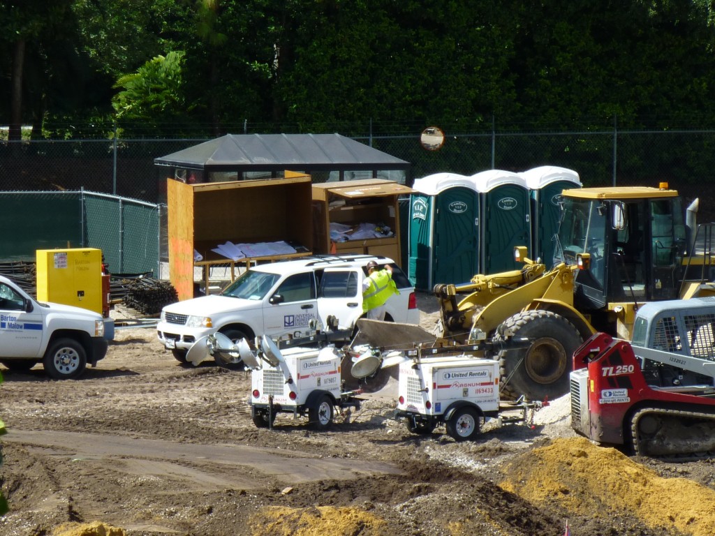 Parta-potties, blueprints, more overnight lights, and trucks from Barton Malow construction as well as Universal Engineering