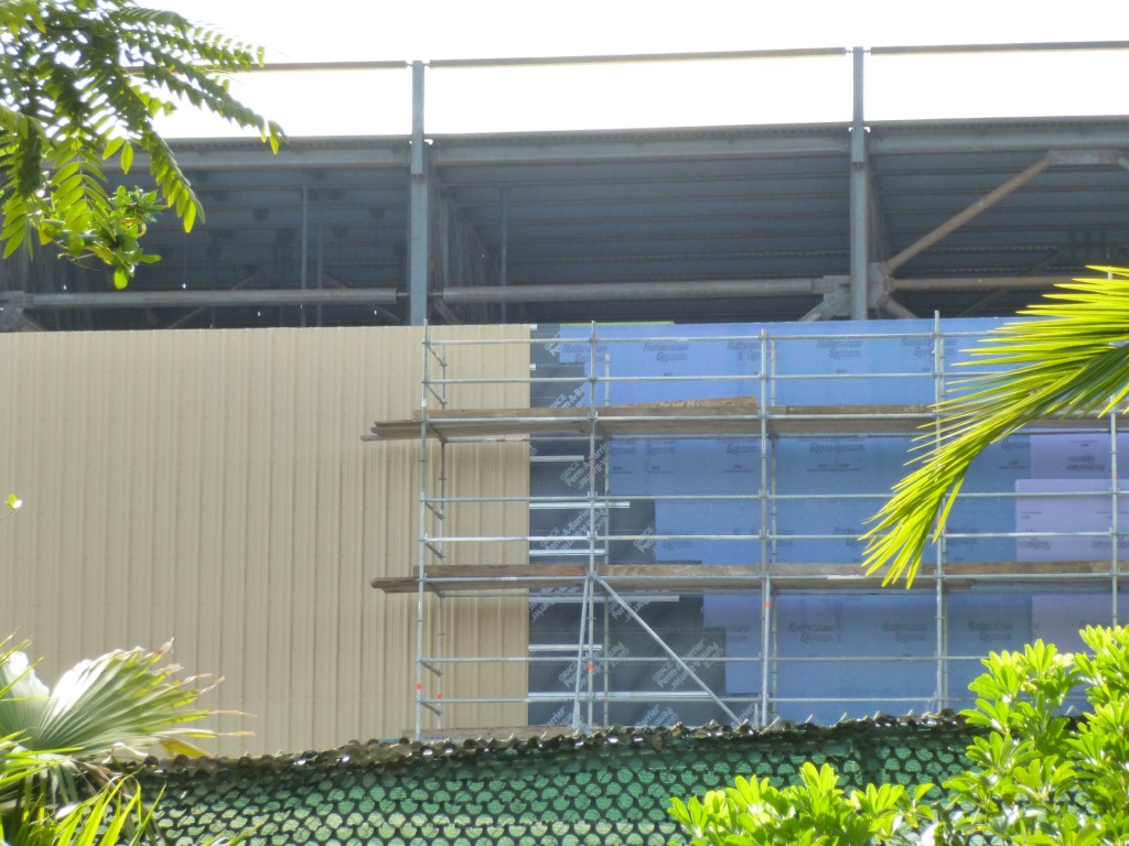 The wall is being finished off with some siding, similar to the exterior of the Gringotts building