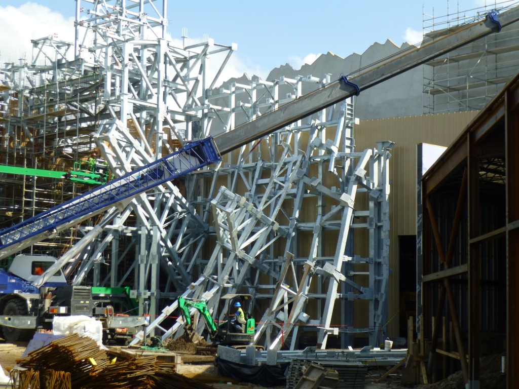 New pillar supports being installed to the right of temple gate entrance