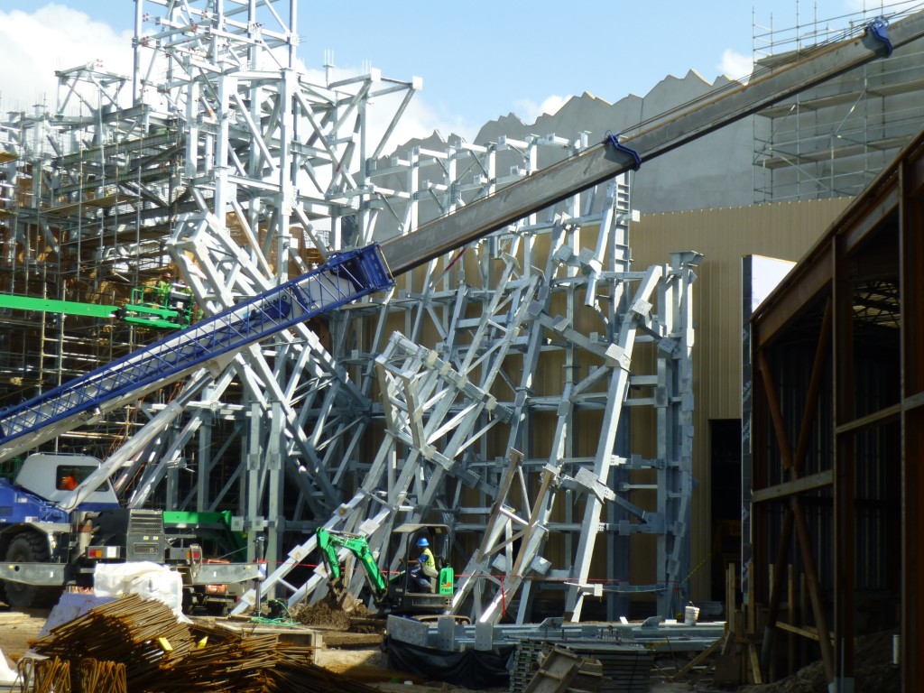 New pillar supports being installed to the right of temple gate entrance