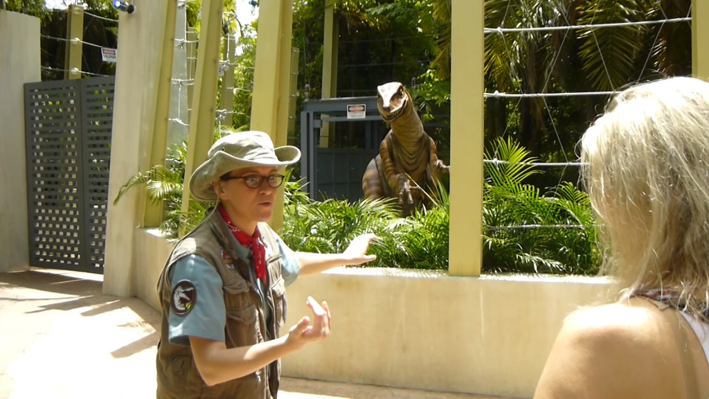 The raptor trainer coaches us on how to act around the raptor