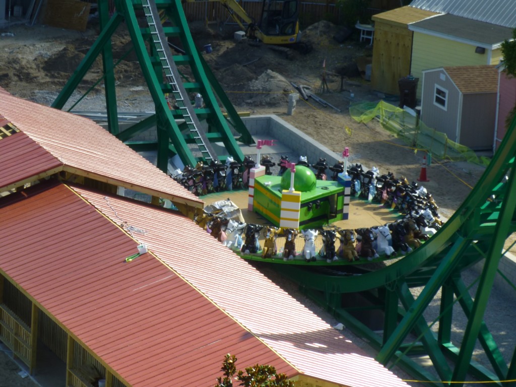 Close up view of Mia's Riding Adventure, the new disc coaster, with its horse-shaped seats