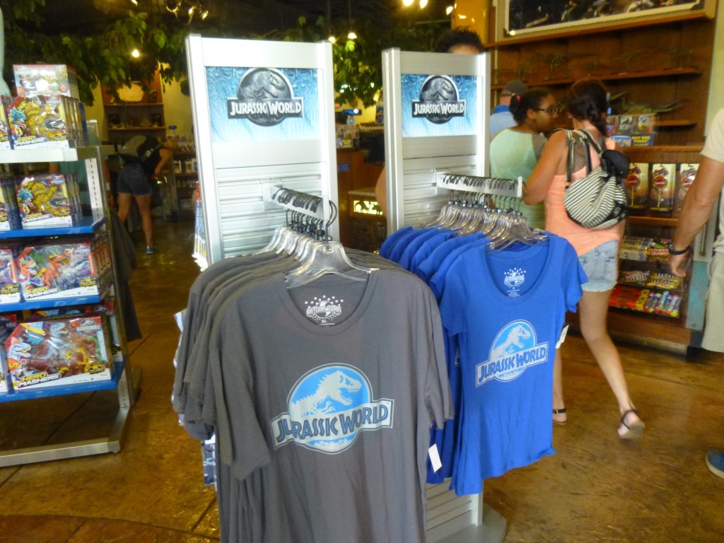 Jurassic World shirts with new logo adorned display shelves