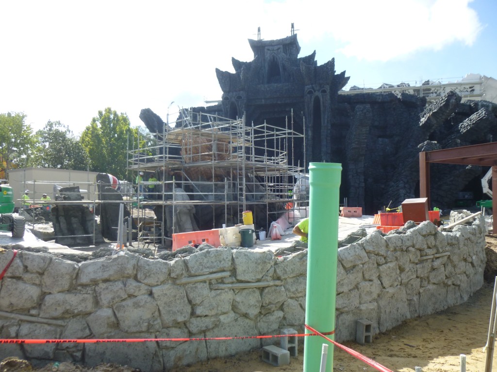 This wall surrounds the outdoor portion of the ride path, with new structures in the center
