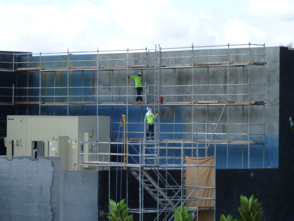 Workers painting