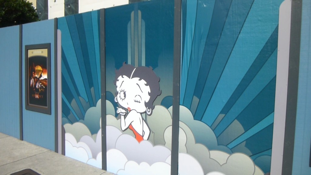 Betty Boop on the construction walls for the future Sanrio store, facing Despicable Me side