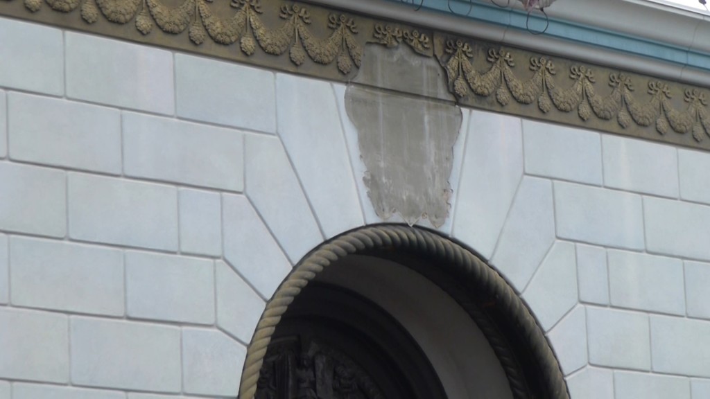 Ornamental piece of concrete with Lucille Ball's initials removed.