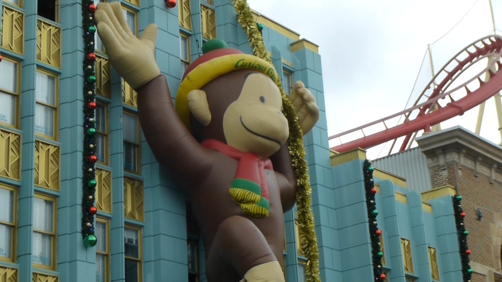 Curious George swinging around New York