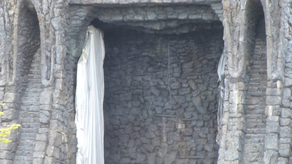 Large temple gates, covered in plastic tarps