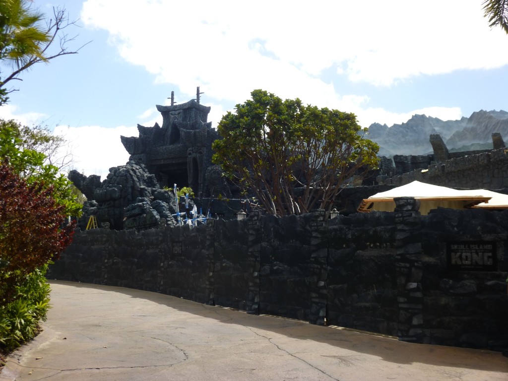 View from Jurassic Park side, gift shop stand and ride exit on the right