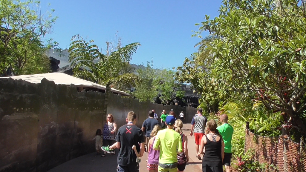 Walking down the pathway in front of Kong. Food stand roof seen on left