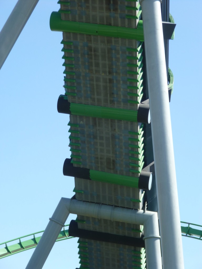 The green poles under launch tunnel being painted black as well