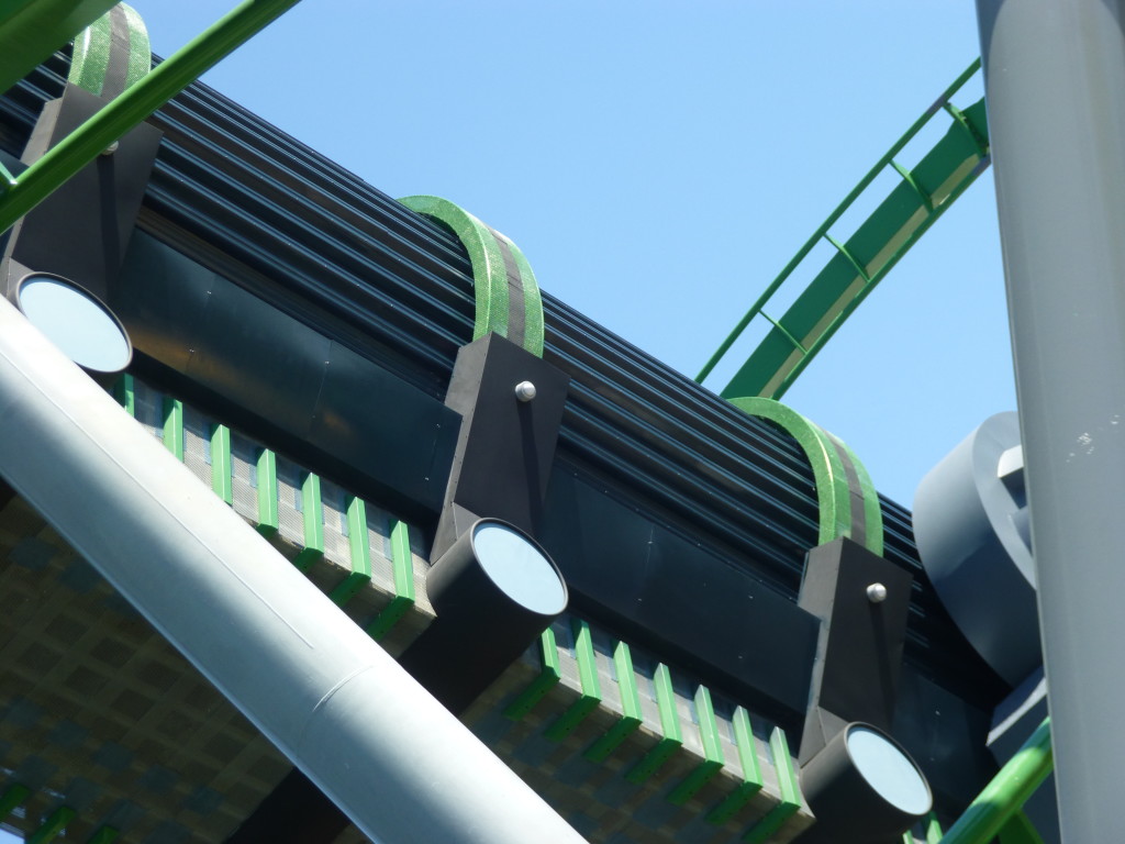 Black stripes being added on green trim around launch tunnel