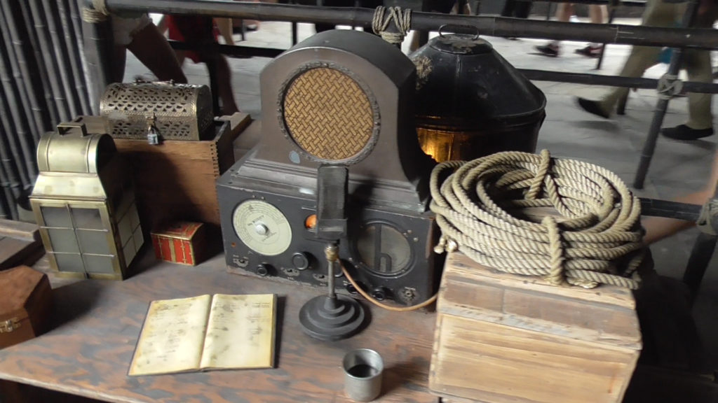 Old-fashioned radio on a desk, spouting news reports and old music