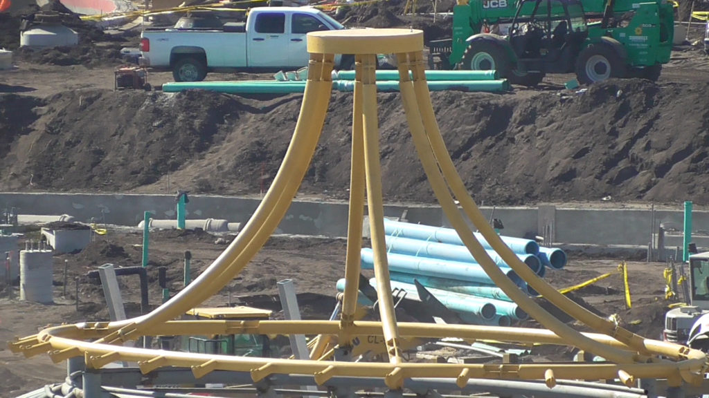 Roof structure in foreground and more lazy river in background