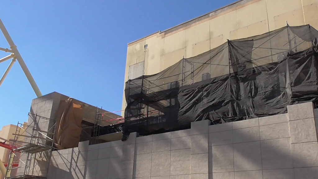 Work continues extended the facade above restrooms