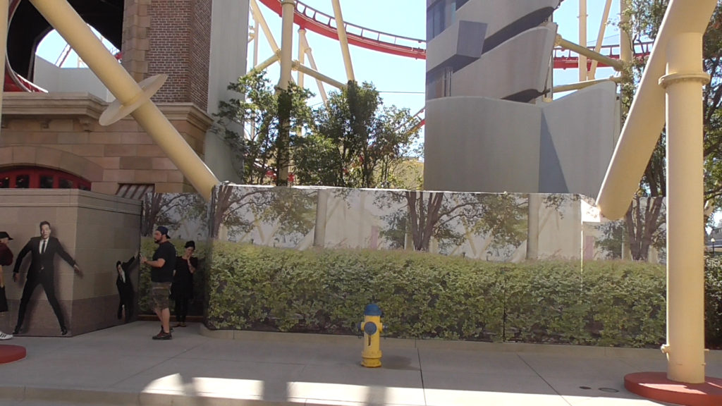 Work walls with printed scrims have gone up around Guggenheim cutout