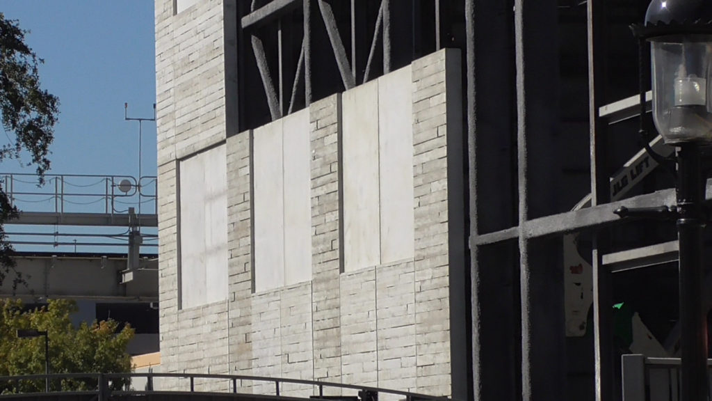 Warehouse style walls going up to enclose the structure