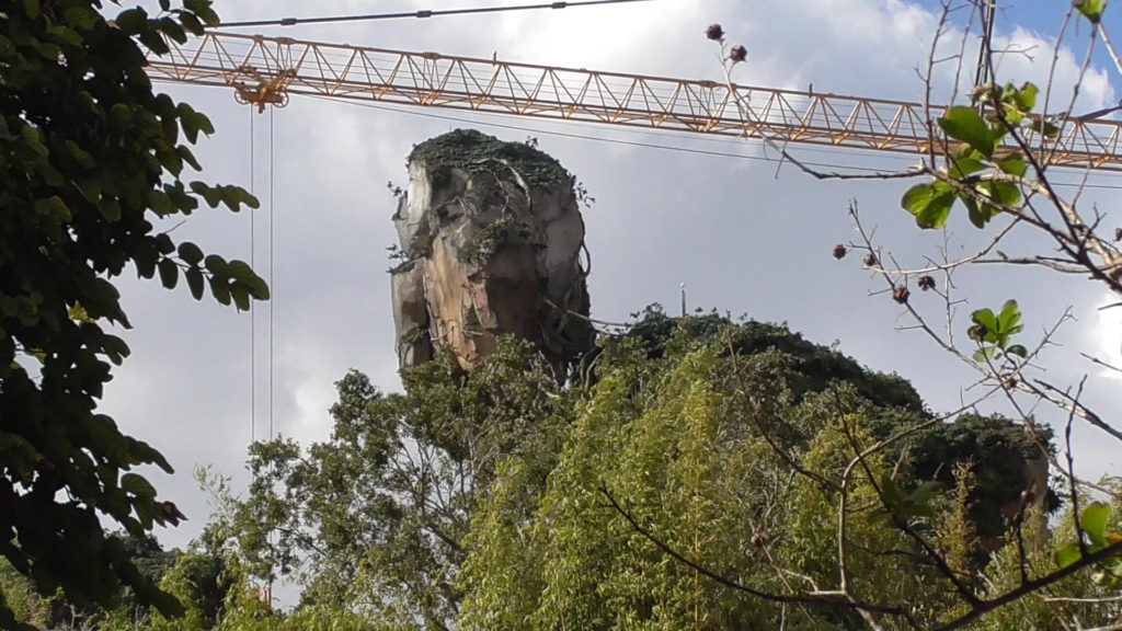 Floating mountains and a large construction crane